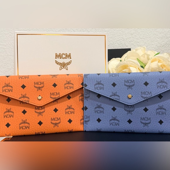 MCM g w/purchase Handbags - (PICK your Color) MCM Blue OR Tan Monogram Clutch- Novelty (price is for one)